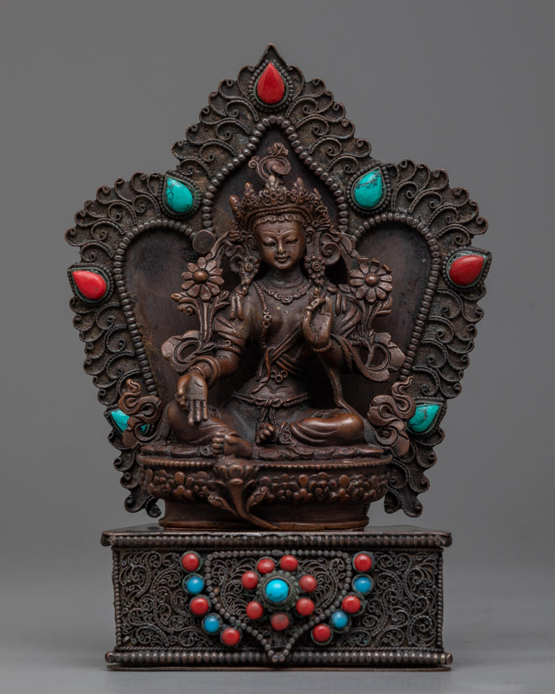 a green tara statue 